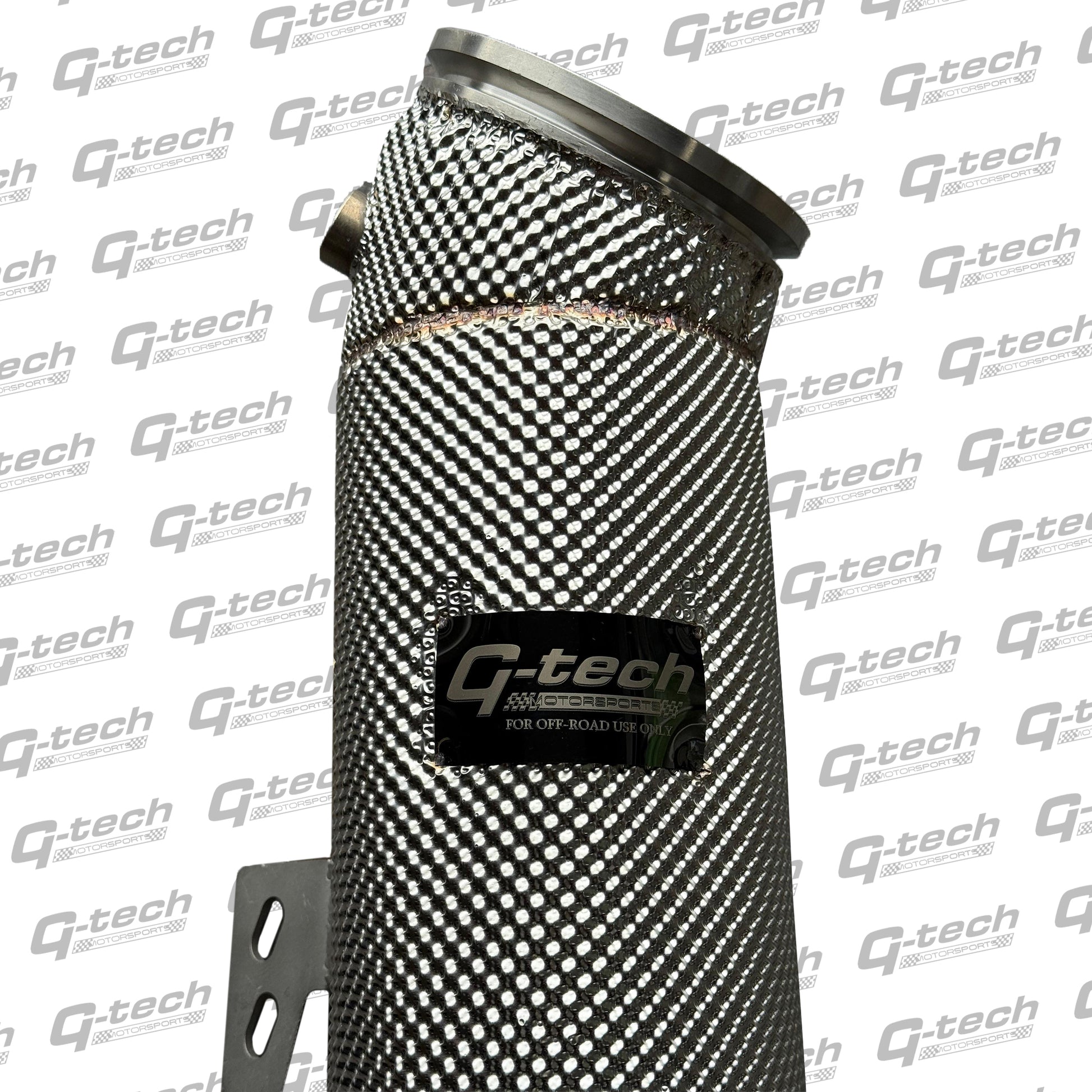Side view of G-tech 5-inch BMW B58 stainless downpipe showing logo and heat shielding.